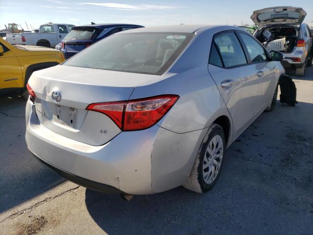 Photo 3 VIN: 5YFBURHE7JP814946 - TOYOTA COROLLA L 