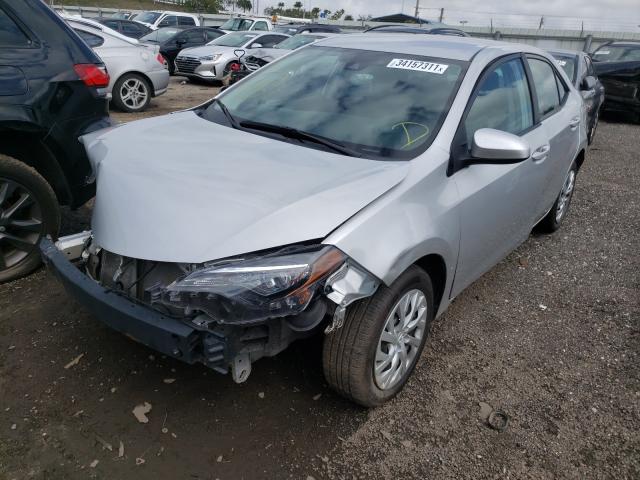 Photo 1 VIN: 5YFBURHE7JP815532 - TOYOTA COROLLA L 