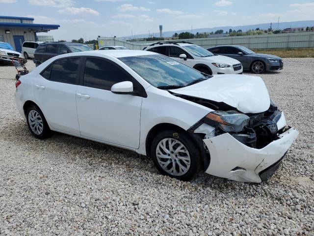 Photo 3 VIN: 5YFBURHE7JP816485 - TOYOTA COROLLA L 