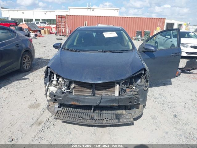 Photo 5 VIN: 5YFBURHE7JP831522 - TOYOTA COROLLA 