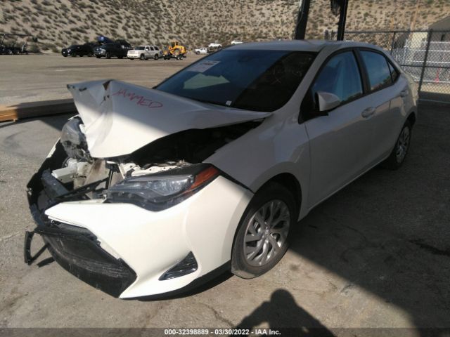 Photo 1 VIN: 5YFBURHE7JP835828 - TOYOTA COROLLA 