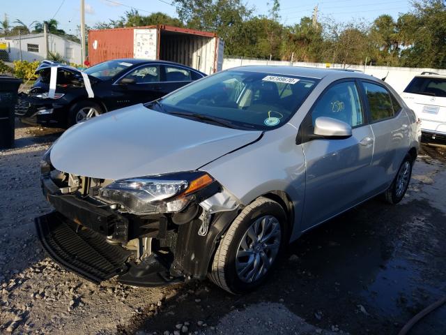 Photo 1 VIN: 5YFBURHE7JP836297 - TOYOTA COROLLA L 