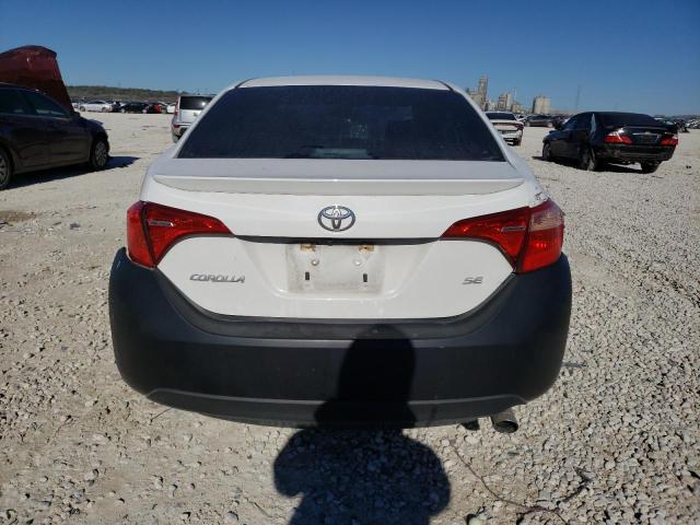 Photo 5 VIN: 5YFBURHE7JP851088 - TOYOTA COROLLA L 