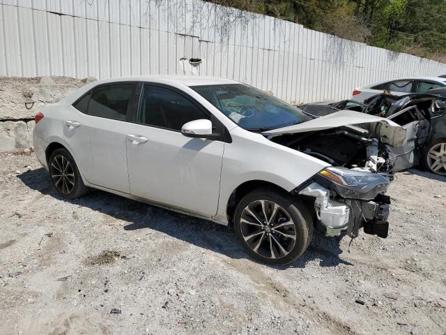 Photo 3 VIN: 5YFBURHE7KP857488 - TOYOTA COROLLA L 