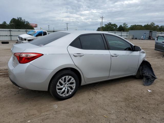 Photo 2 VIN: 5YFBURHE7KP860276 - TOYOTA COROLLA L 