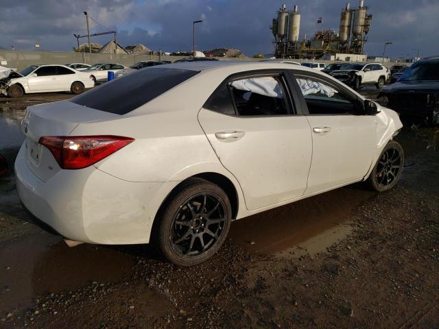 Photo 2 VIN: 5YFBURHE7KP860424 - TOYOTA COROLLA L 