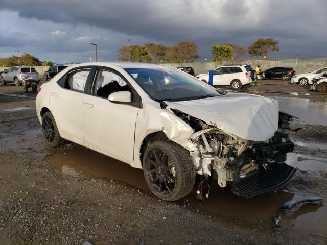 Photo 3 VIN: 5YFBURHE7KP860424 - TOYOTA COROLLA L 