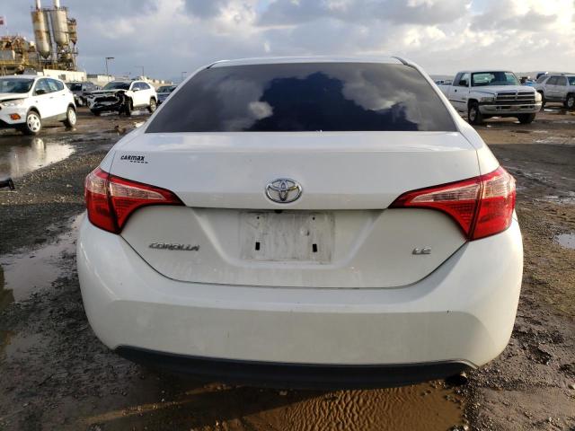 Photo 5 VIN: 5YFBURHE7KP860424 - TOYOTA COROLLA L 