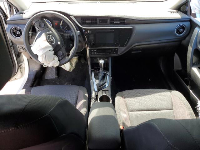 Photo 7 VIN: 5YFBURHE7KP860424 - TOYOTA COROLLA L 