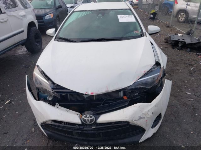 Photo 5 VIN: 5YFBURHE7KP863212 - TOYOTA COROLLA 