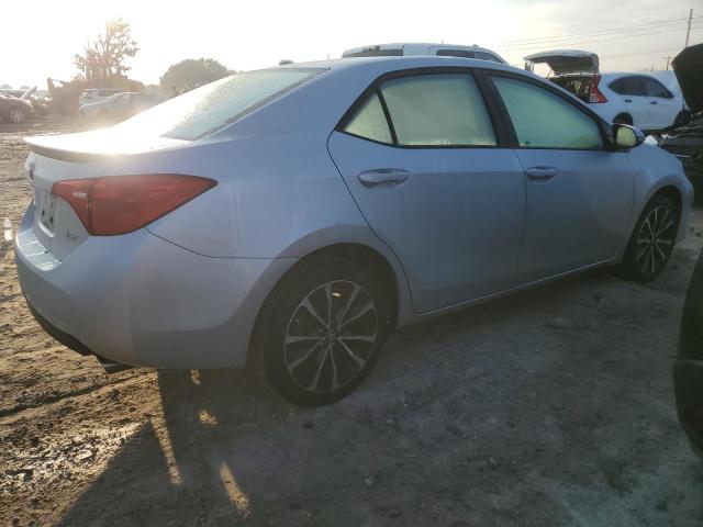 Photo 2 VIN: 5YFBURHE7KP863288 - TOYOTA COROLLA L 