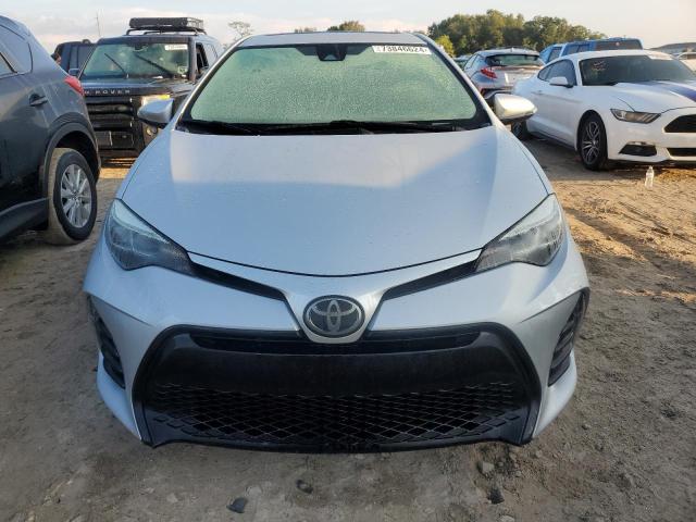 Photo 4 VIN: 5YFBURHE7KP863288 - TOYOTA COROLLA L 