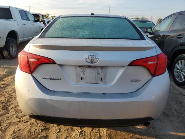 Photo 5 VIN: 5YFBURHE7KP863288 - TOYOTA COROLLA L 