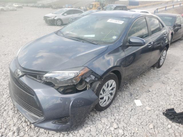 Photo 1 VIN: 5YFBURHE7KP864490 - TOYOTA COROLLA L 