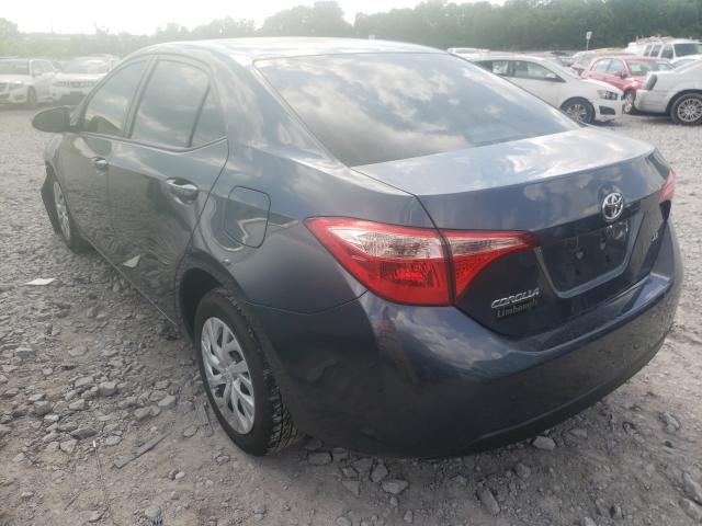 Photo 2 VIN: 5YFBURHE7KP864490 - TOYOTA COROLLA L 