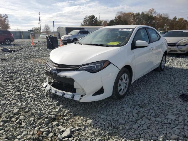 Photo 1 VIN: 5YFBURHE7KP864702 - TOYOTA COROLLA L 