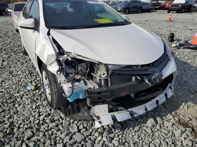 Photo 8 VIN: 5YFBURHE7KP864702 - TOYOTA COROLLA L 