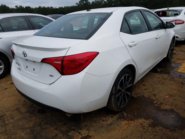 Photo 3 VIN: 5YFBURHE7KP865235 - TOYOTA COROLLA L 