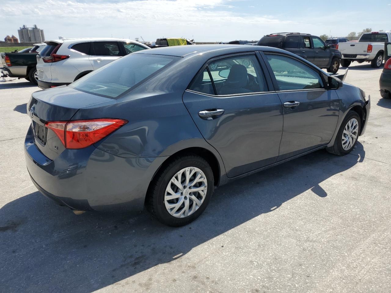 Photo 2 VIN: 5YFBURHE7KP869804 - TOYOTA COROLLA 