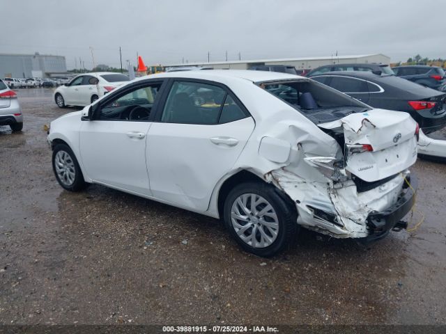 Photo 2 VIN: 5YFBURHE7KP870905 - TOYOTA COROLLA 