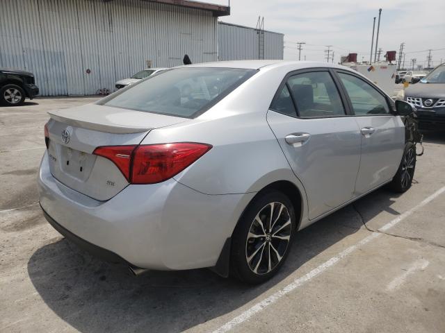 Photo 3 VIN: 5YFBURHE7KP873061 - TOYOTA COROLLA L 