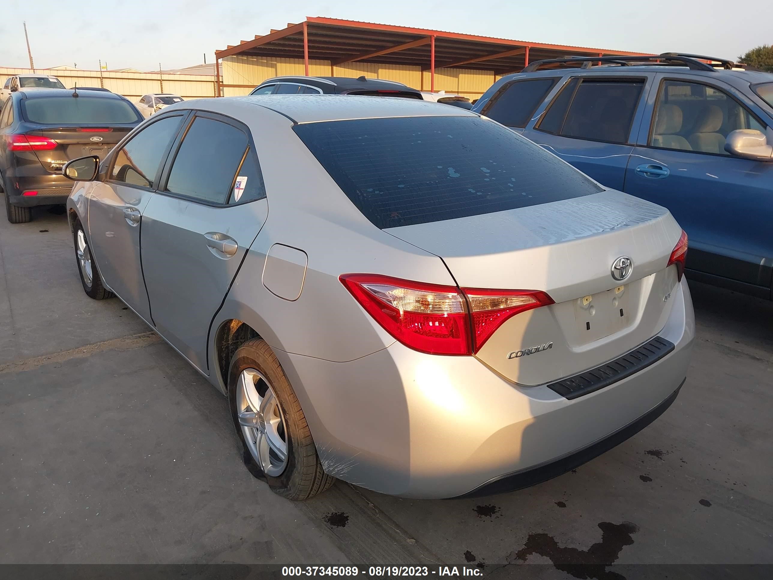 Photo 2 VIN: 5YFBURHE7KP874615 - TOYOTA COROLLA 