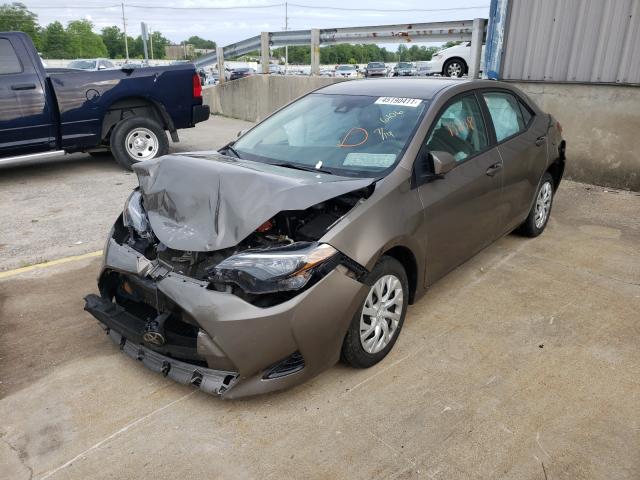 Photo 1 VIN: 5YFBURHE7KP876106 - TOYOTA COROLLA L 