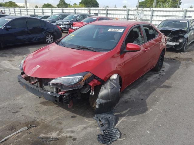 Photo 1 VIN: 5YFBURHE7KP877305 - TOYOTA COROLLA L 