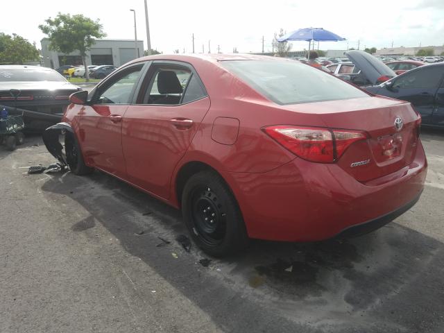 Photo 2 VIN: 5YFBURHE7KP877305 - TOYOTA COROLLA L 