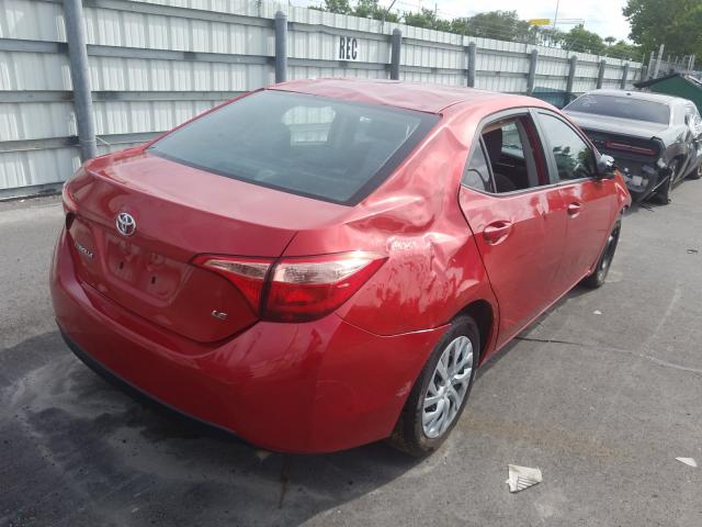 Photo 3 VIN: 5YFBURHE7KP877305 - TOYOTA COROLLA L 