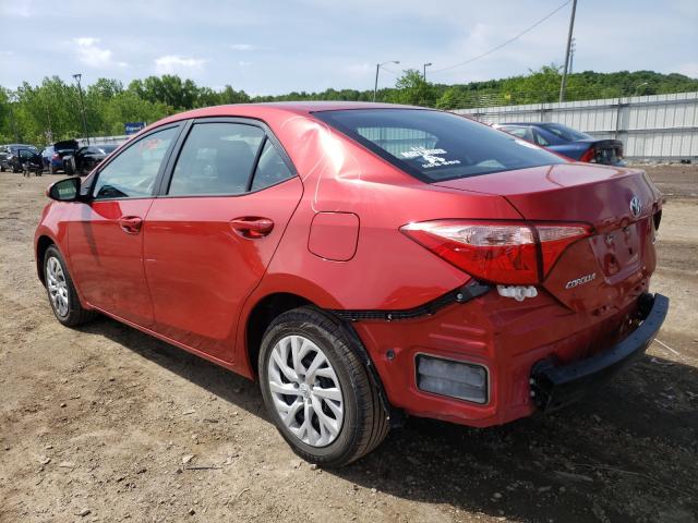 Photo 2 VIN: 5YFBURHE7KP877496 - TOYOTA COROLLA L 