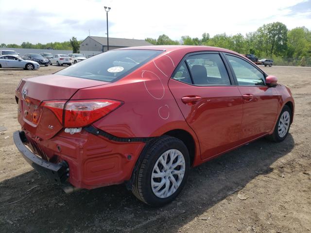 Photo 3 VIN: 5YFBURHE7KP877496 - TOYOTA COROLLA L 