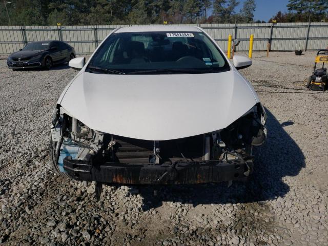 Photo 4 VIN: 5YFBURHE7KP878454 - TOYOTA COROLLA L 