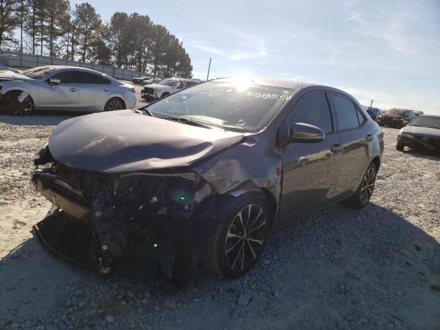 Photo 1 VIN: 5YFBURHE7KP879426 - TOYOTA COROLLA L 