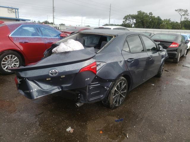 Photo 3 VIN: 5YFBURHE7KP881757 - TOYOTA COROLLA L 