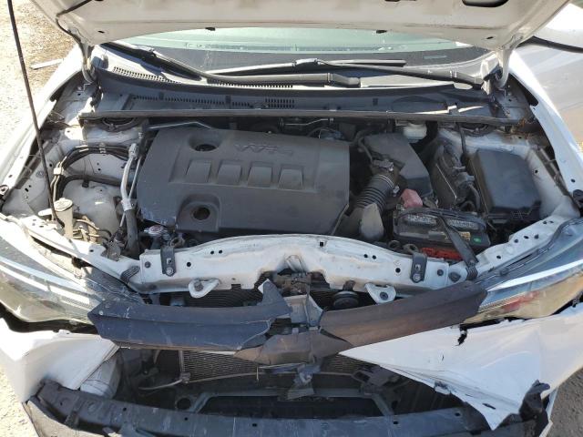 Photo 10 VIN: 5YFBURHE7KP883007 - TOYOTA COROLLA L 