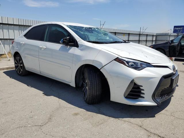 Photo 3 VIN: 5YFBURHE7KP883265 - TOYOTA COROLLA 