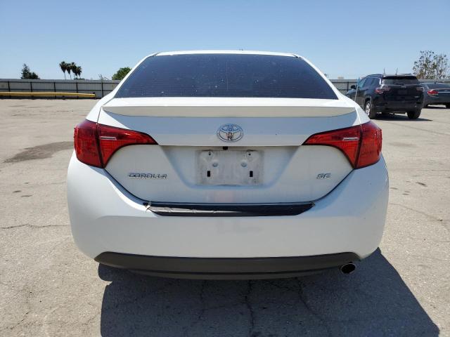 Photo 5 VIN: 5YFBURHE7KP883265 - TOYOTA COROLLA 