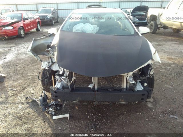 Photo 5 VIN: 5YFBURHE7KP884366 - TOYOTA COROLLA 