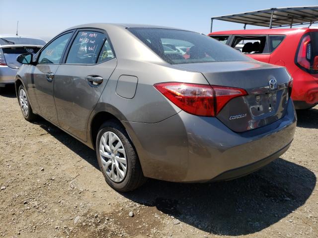 Photo 2 VIN: 5YFBURHE7KP886893 - TOYOTA COROLLA L 