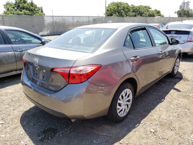 Photo 3 VIN: 5YFBURHE7KP886893 - TOYOTA COROLLA L 