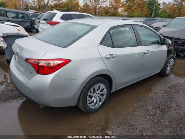 Photo 3 VIN: 5YFBURHE7KP887185 - TOYOTA COROLLA 