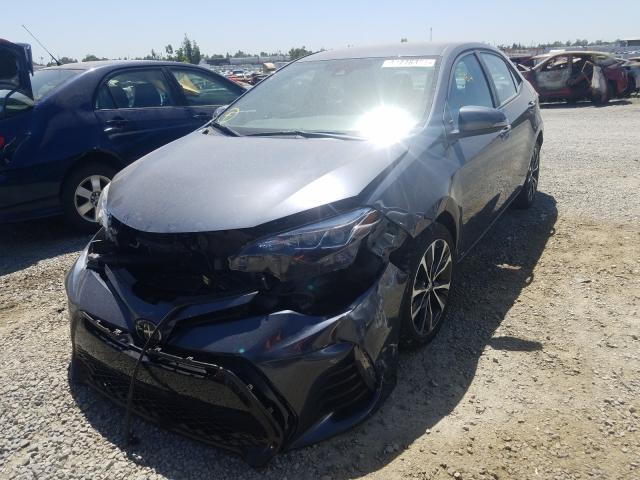 Photo 1 VIN: 5YFBURHE7KP889938 - TOYOTA COROLLA L 