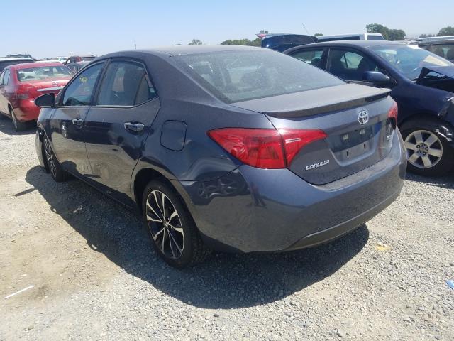 Photo 2 VIN: 5YFBURHE7KP889938 - TOYOTA COROLLA L 