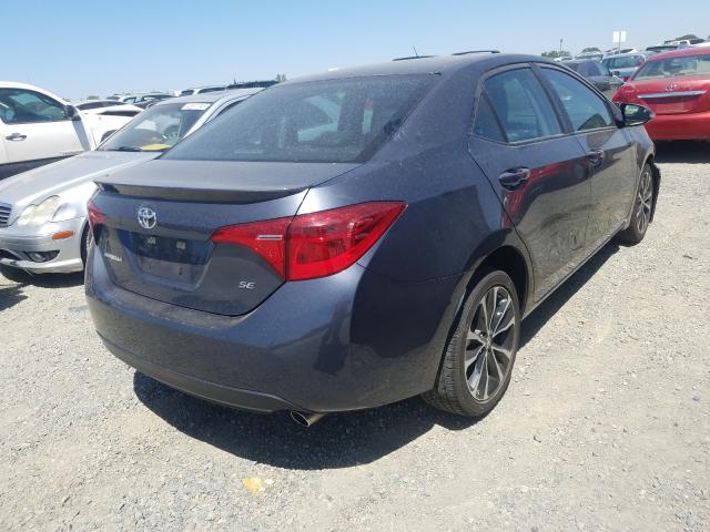 Photo 3 VIN: 5YFBURHE7KP889938 - TOYOTA COROLLA L 