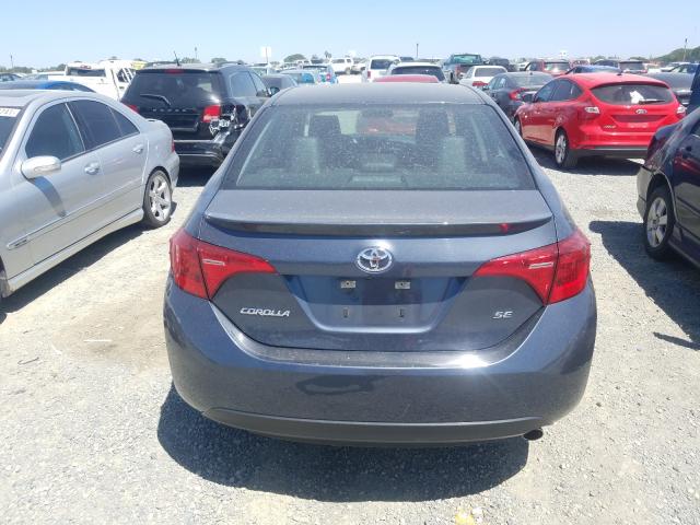 Photo 8 VIN: 5YFBURHE7KP889938 - TOYOTA COROLLA L 