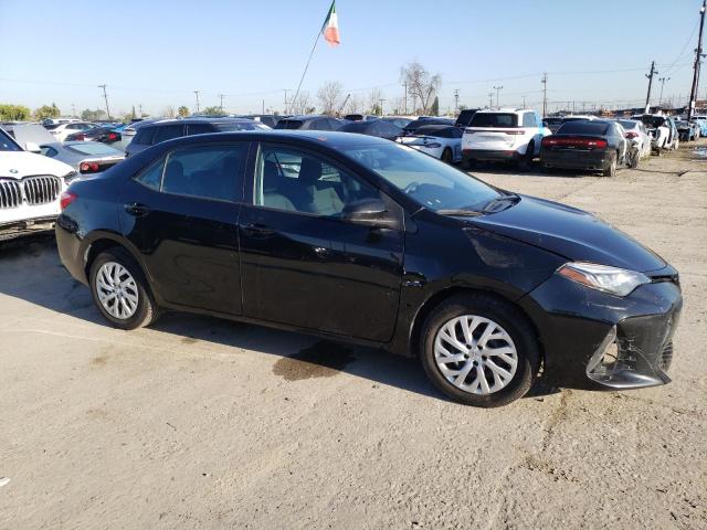 Photo 3 VIN: 5YFBURHE7KP890121 - TOYOTA COROLLA 