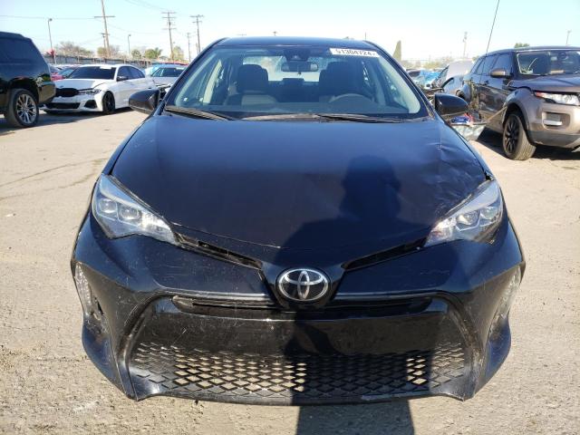 Photo 4 VIN: 5YFBURHE7KP890121 - TOYOTA COROLLA 