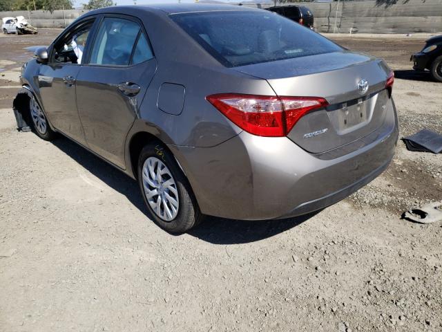 Photo 2 VIN: 5YFBURHE7KP891107 - TOYOTA COROLLA L 