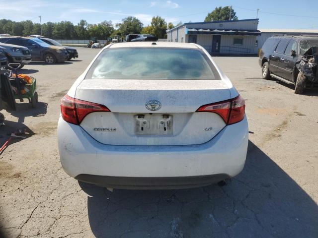 Photo 5 VIN: 5YFBURHE7KP891222 - TOYOTA COROLLA L 